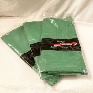 Three Green Plastic Table Covers